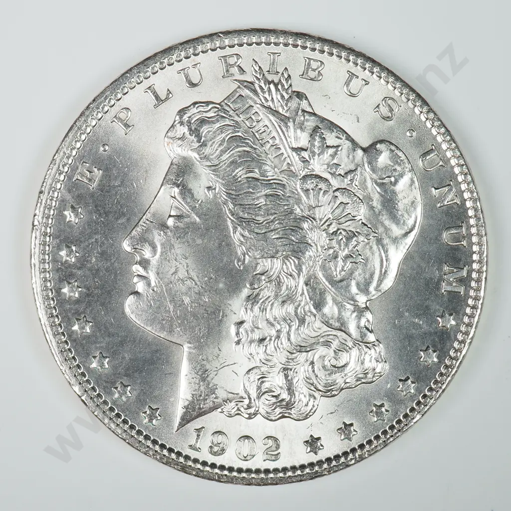Morgan Dollar: 1902 O - MS60 C.V USD $124 ( NZD $215 ) MS65 C.V USD $324 ( NZD $565 ) Image 1++
