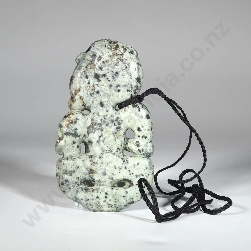 Pounamu Tiki With Plaited Cord 128 x 73mm. Image 1++
