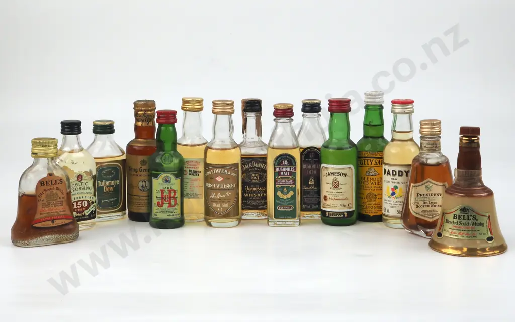 Quantity Of Miniature Whiskey/ Whisky Bottles Including a Miniature Wade Bells Scotch Whisky Decanter In A  Bell Shape Image 1++