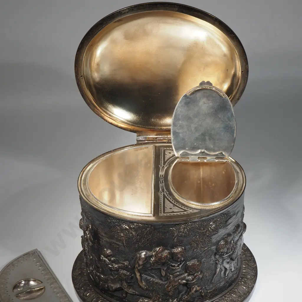 Silver Plate Oval Tea Caddy Embossed w Scenes From Roman Mythology Depicting Pan Goats & Cupid Figures Image 1++