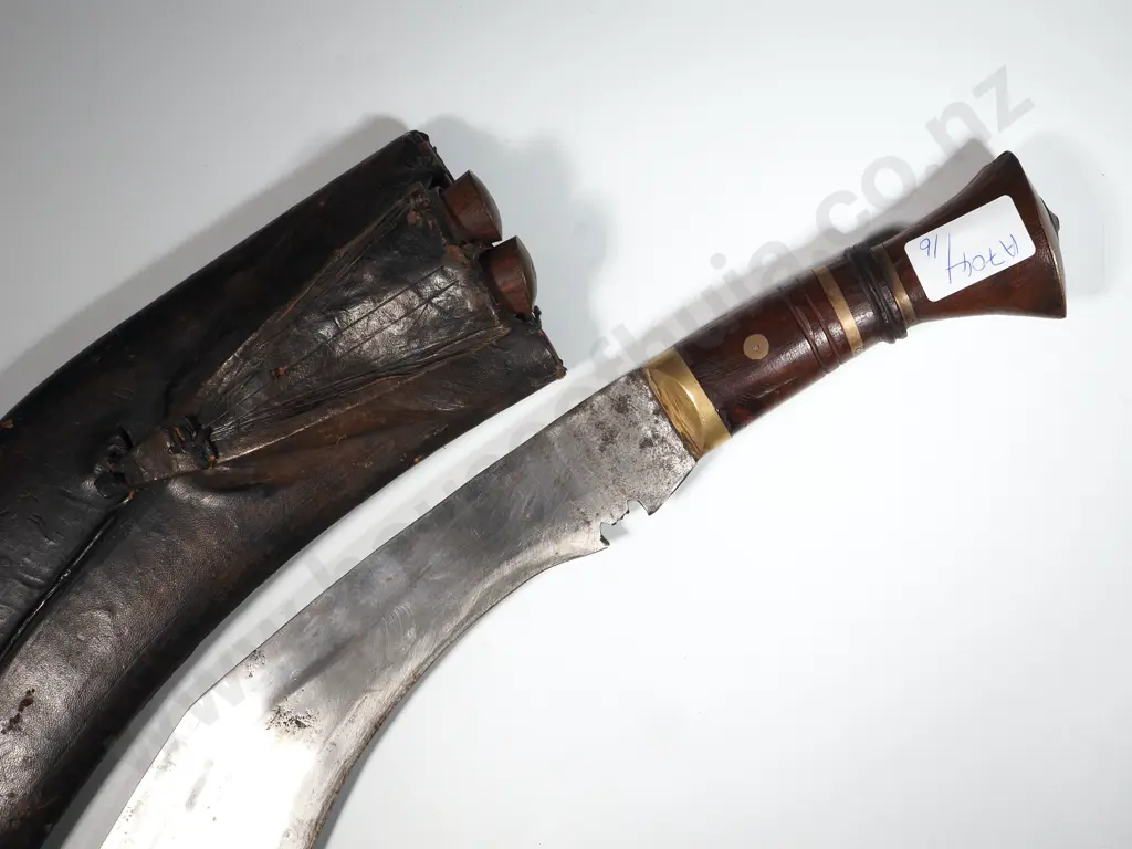 Kukhri Knife in a Leather Scabbard w Two Companion Knives. Image 1++