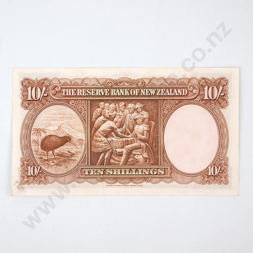 TEN SHILLINGS, FLEMING SIGNATURE, SERIAL 2J 056750, UNCIRCULATED, C.V. $175 Image 1++