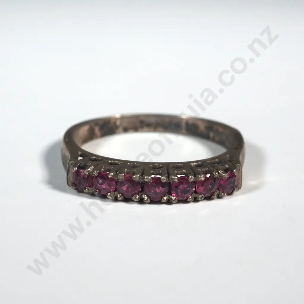 Sterling Silver Bridge Set Ring Comprising Five Red Stone Interspersed With Two Small Red Stones Image 1++