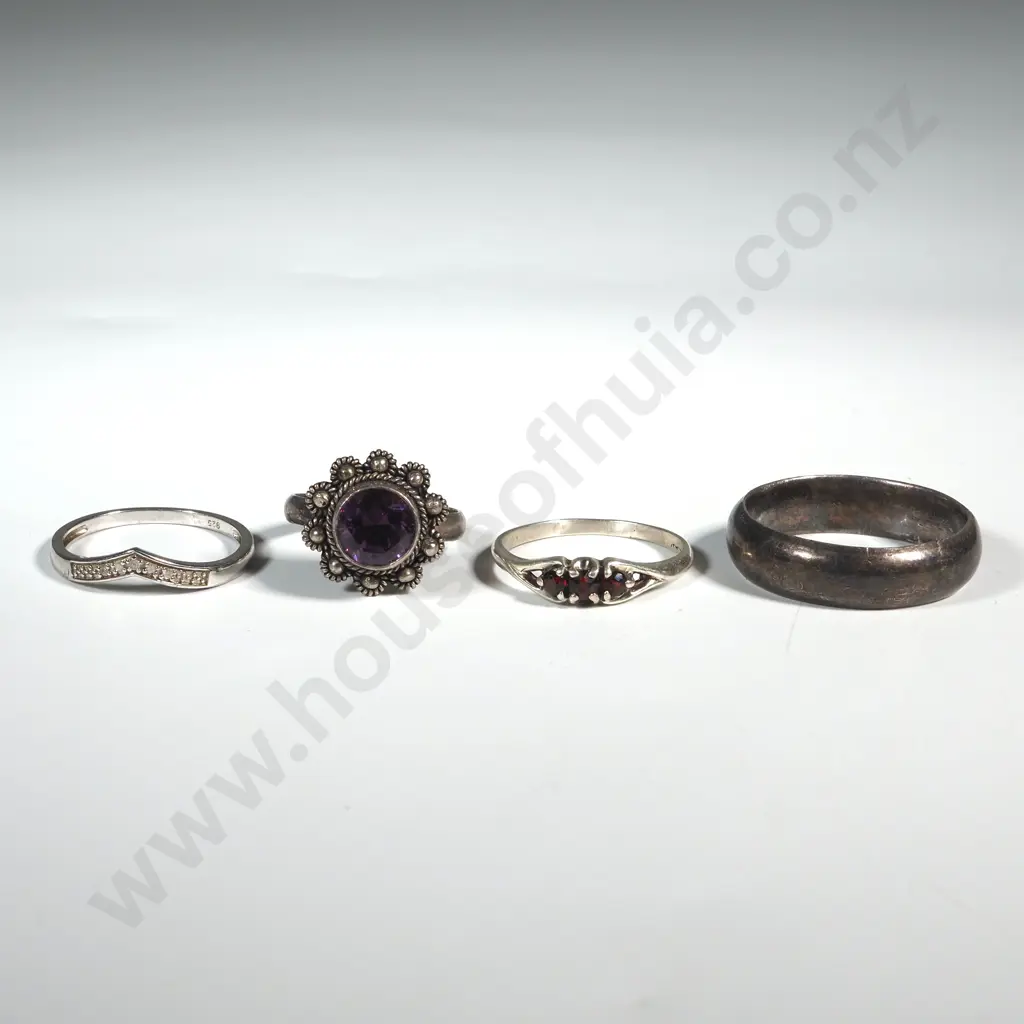 Four Sterling Silver Rings. One Set With an Circular Faceted Amethyst Image 1++
