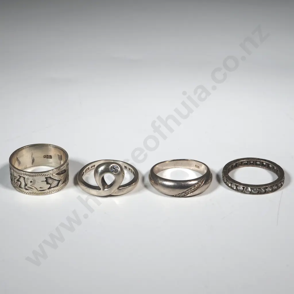Four Sterling Silver Rings. One White Stone  Channel Set Image 1++