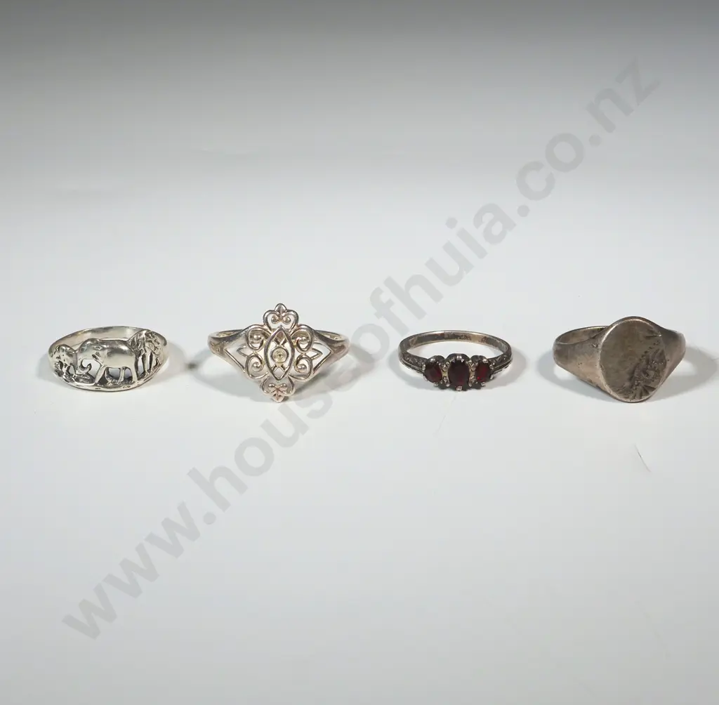 Four Sterling Silver Rings Of Varying Sizes. One Set With Stones. Image 1++