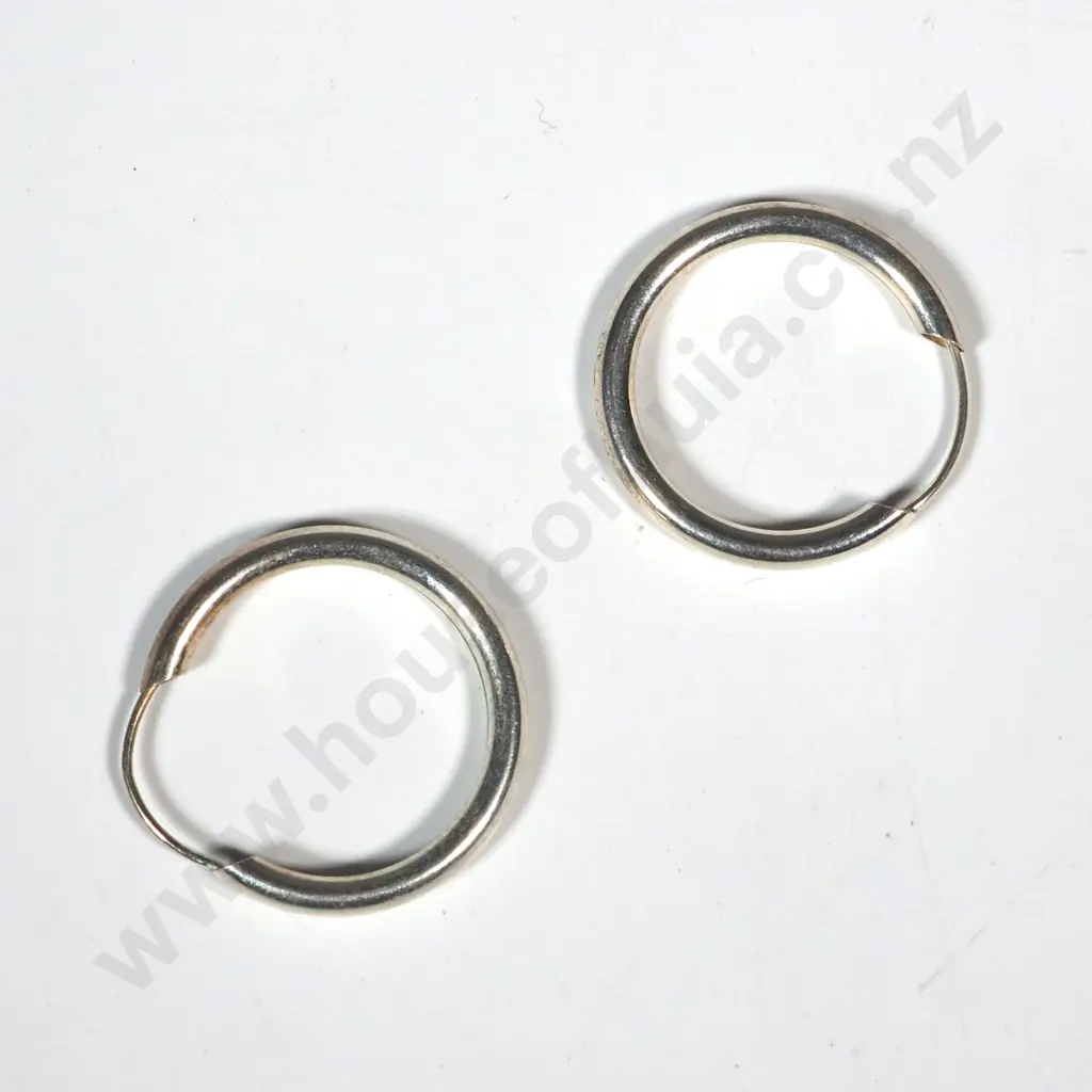 Pair Of Sterling Silver Hoop Earrings With Infinity Closure Image 1++