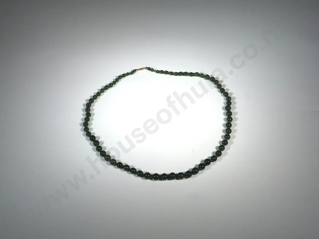 String Of Graduated Greenstone Beads Image 1++