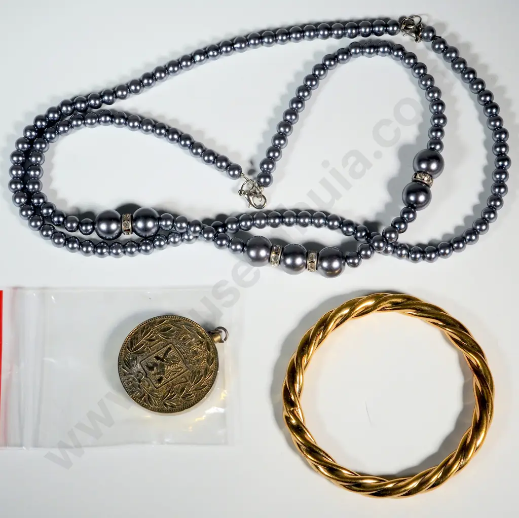 Silver/Gold Coloured Pendant w Crown/Lion & L 7 Motif, Gold Coloured Bangle, Two Black Pearl Style Necklaces. Image 1++