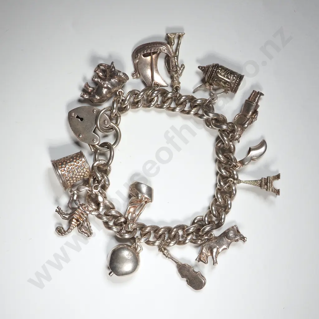Sterling Silver Charm Bracelet With A Large Quantity Of Charms Including Steins, Elephant, Bull, Vikings, Violin Etc. Image 1++