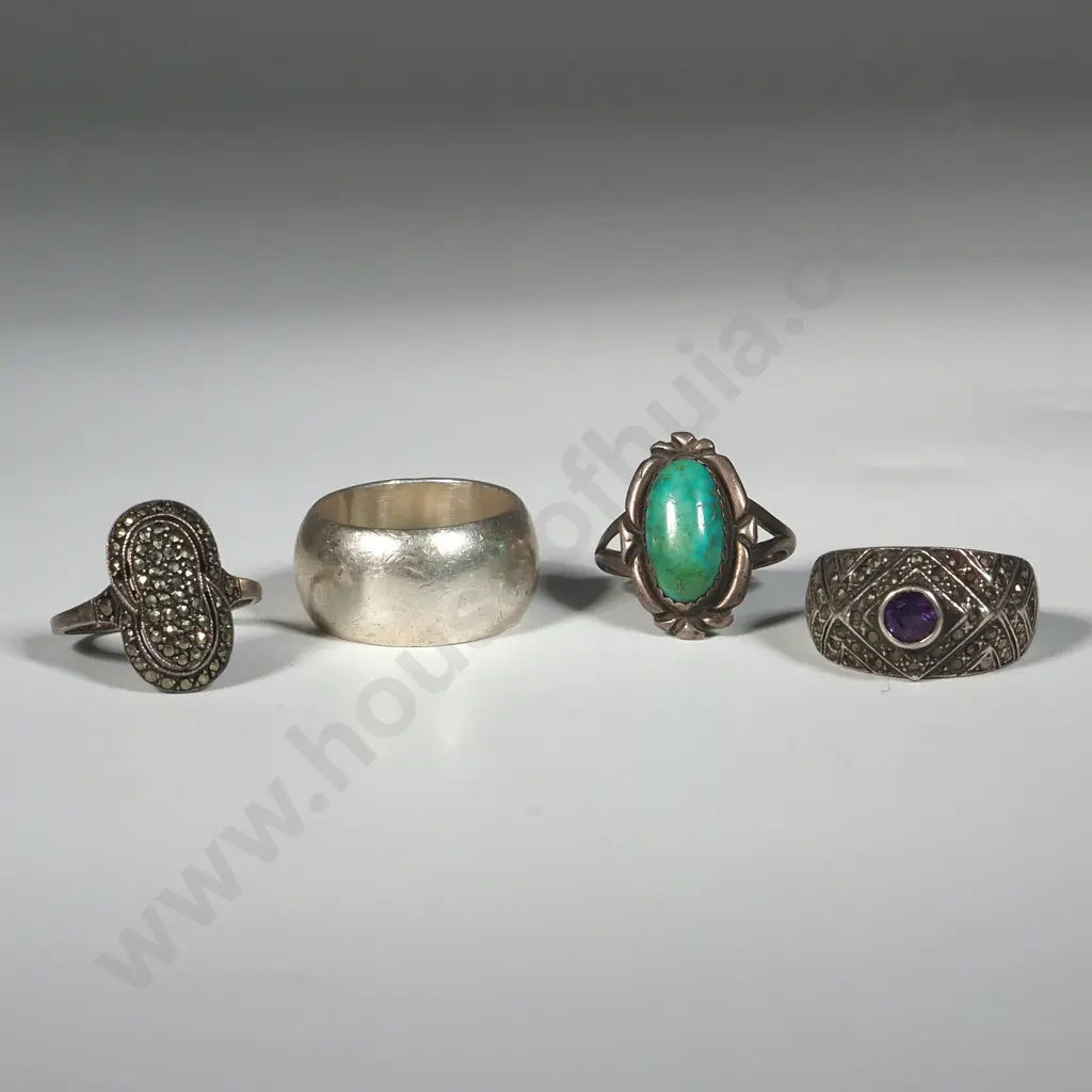 Four Sterling Silver Rings. Including A Marcasite Ring Set With An Amethyst Image 1++