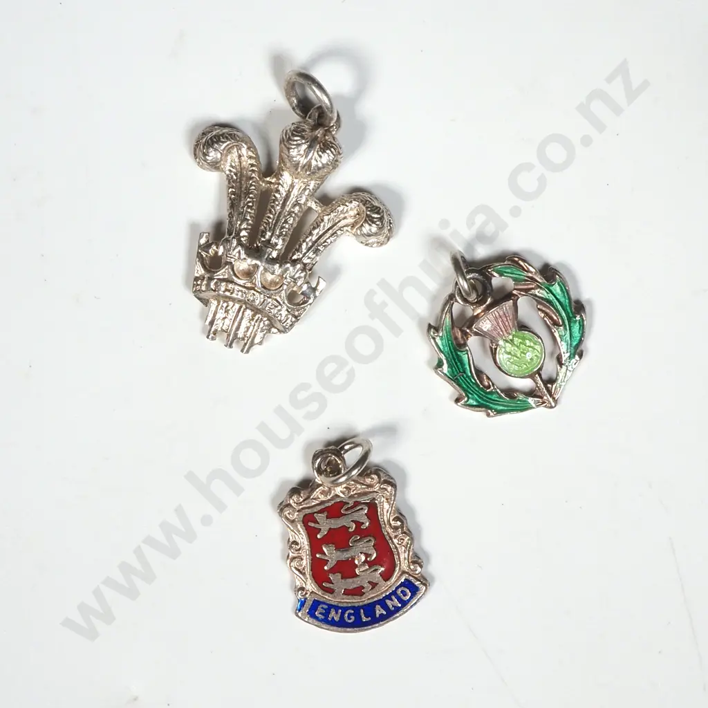 Lot of Three Sterling Silver Pendents. Image 1++