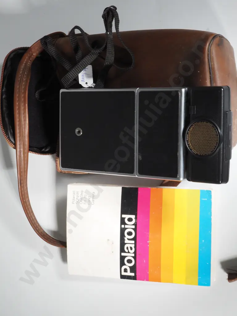 Polaroid SX-70 Land Camera,  Folding Body Design. Image 1++