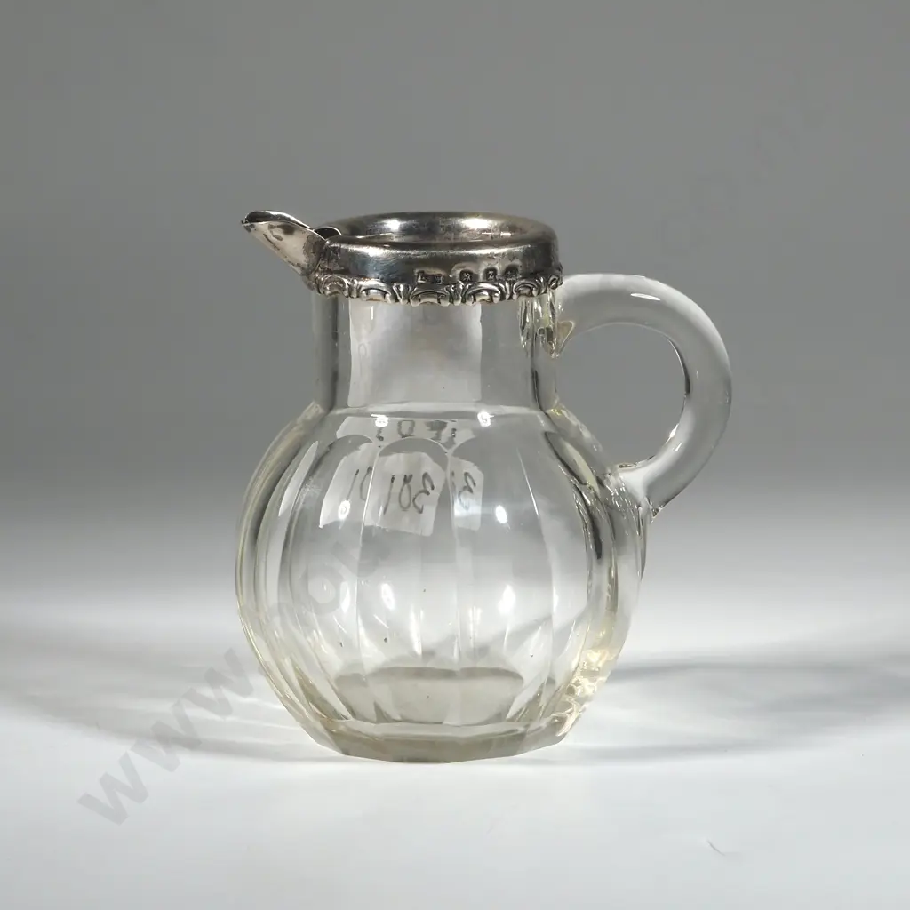 Sterling Silver Rimmed Glass Jug. Image 1++