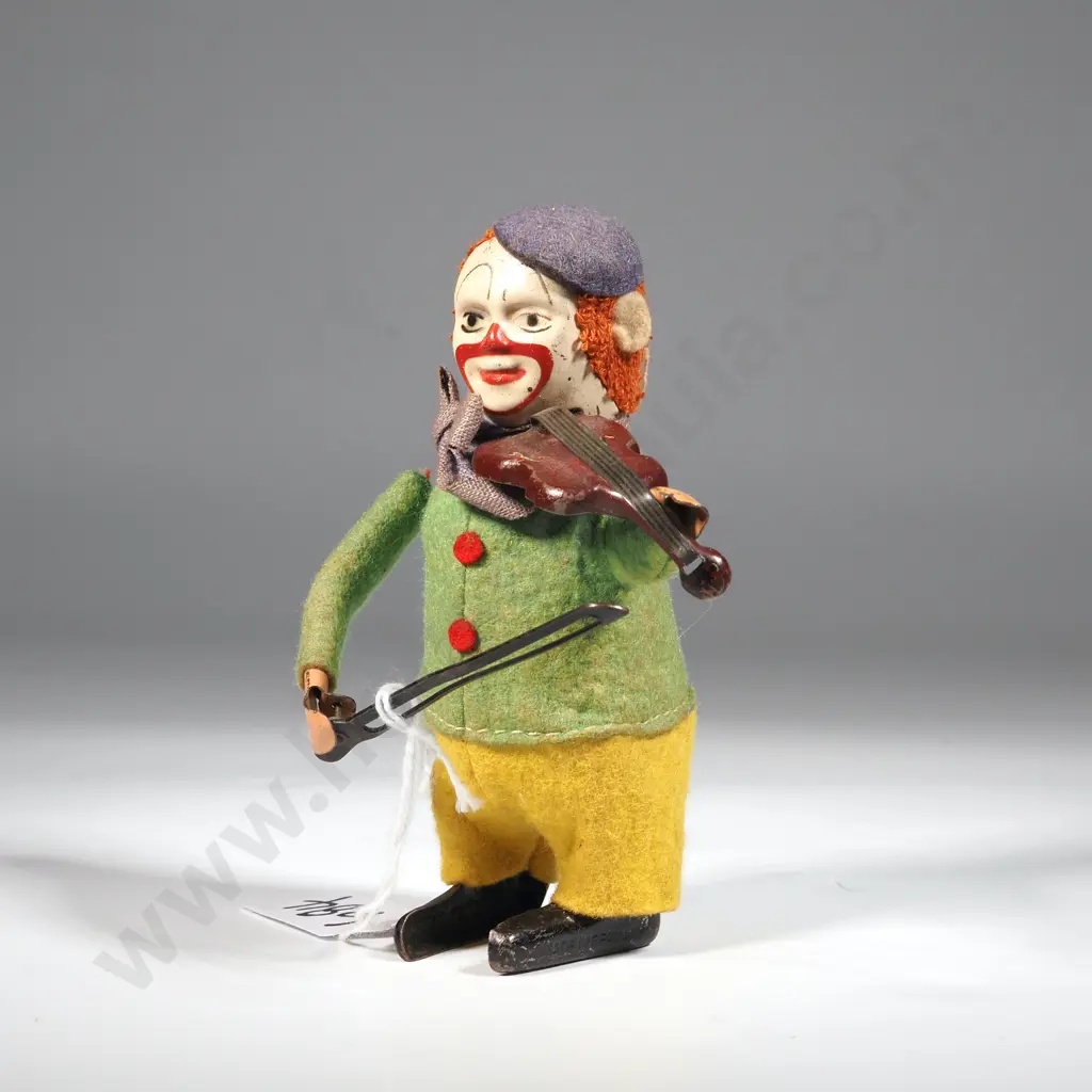 Vintage Schuco Solisto Clown Violin Player Wind Up Toy. Image 1++