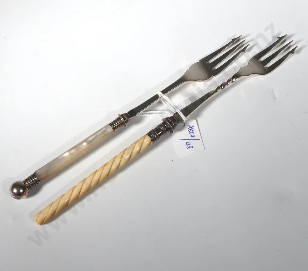 Two Antique Silver Plate Pickle Forks. One with Ivory Twist Handle & The Other Mother Of Pearl.  Image 1++